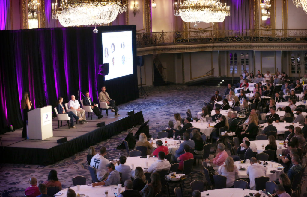 Julie Marks with fellow panelists Scott Leggat, Steve Milo, and Toby Babich and moderator Tiffany Edwards in a VRMA 2022 Spring Forum session about advocacy around the country. 