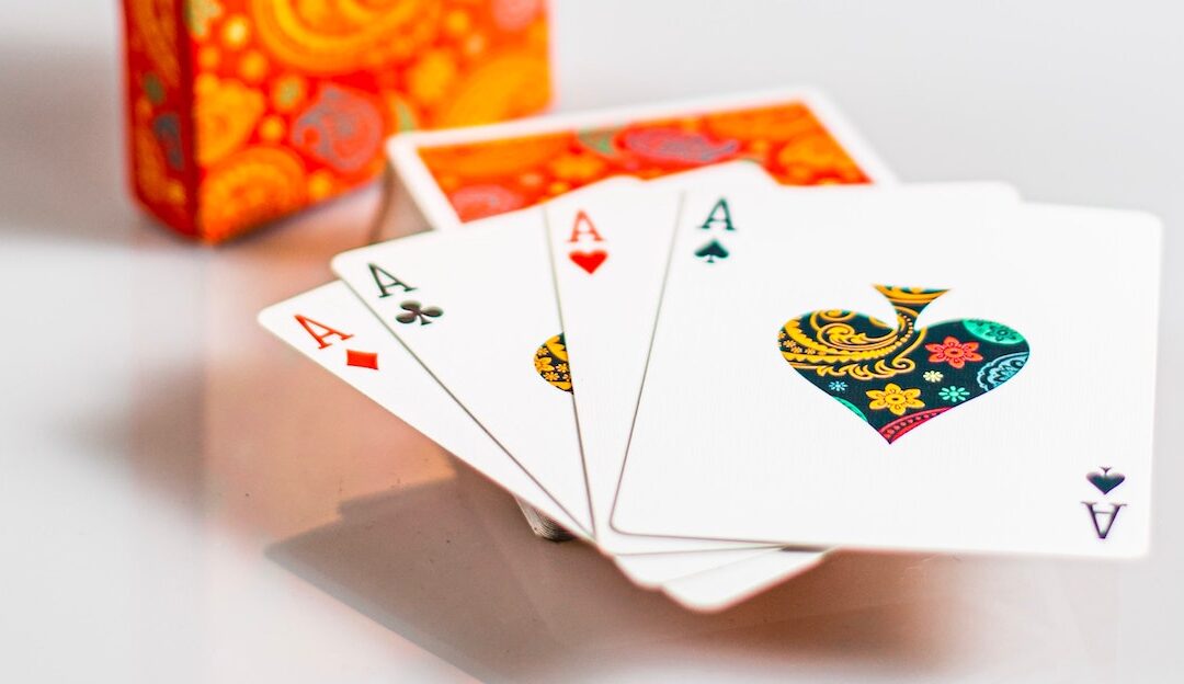 deck of cards and hand of aces representing short-term rental advocacy tools